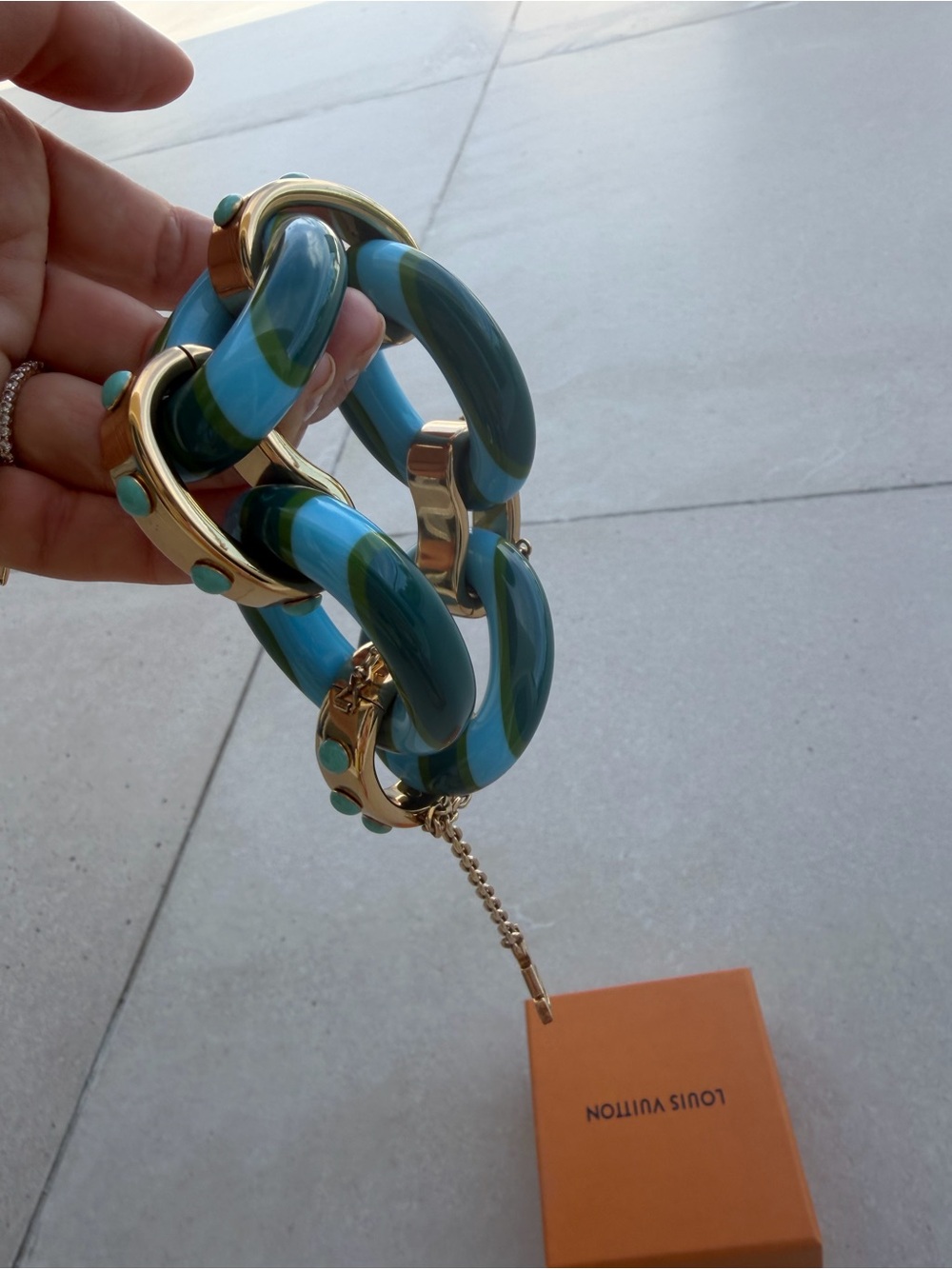 Louis Vuitton Blue and Turquoise Striped Resin Bracelet with Gold LV Charm - Picture 9 of 13
